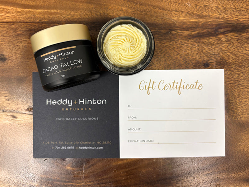 Picture of Beef Tallow  Skincare Product Gift Card and Beef Tallow Moisturizers on a Wooden Table